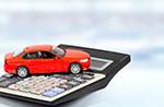 Modellauto auf Taschenrechner